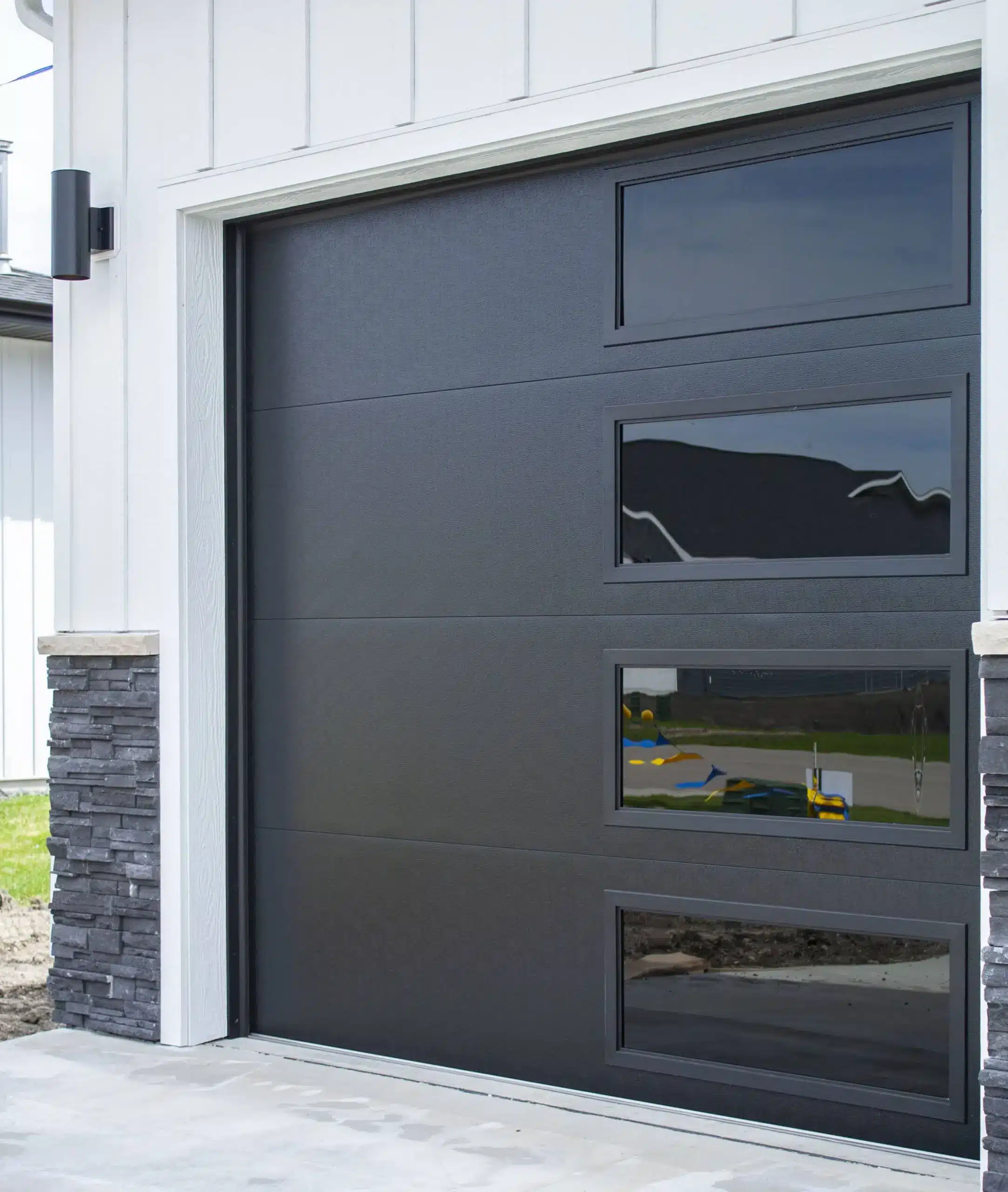 Williams Door Company Black flush panel garage door